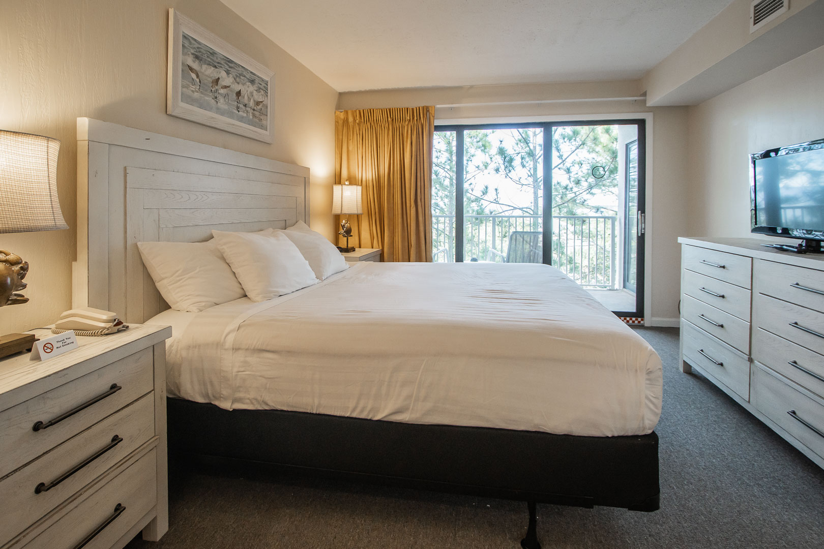 An airy master bedroom at VRI's Bay Club of Sandestin in Florida.